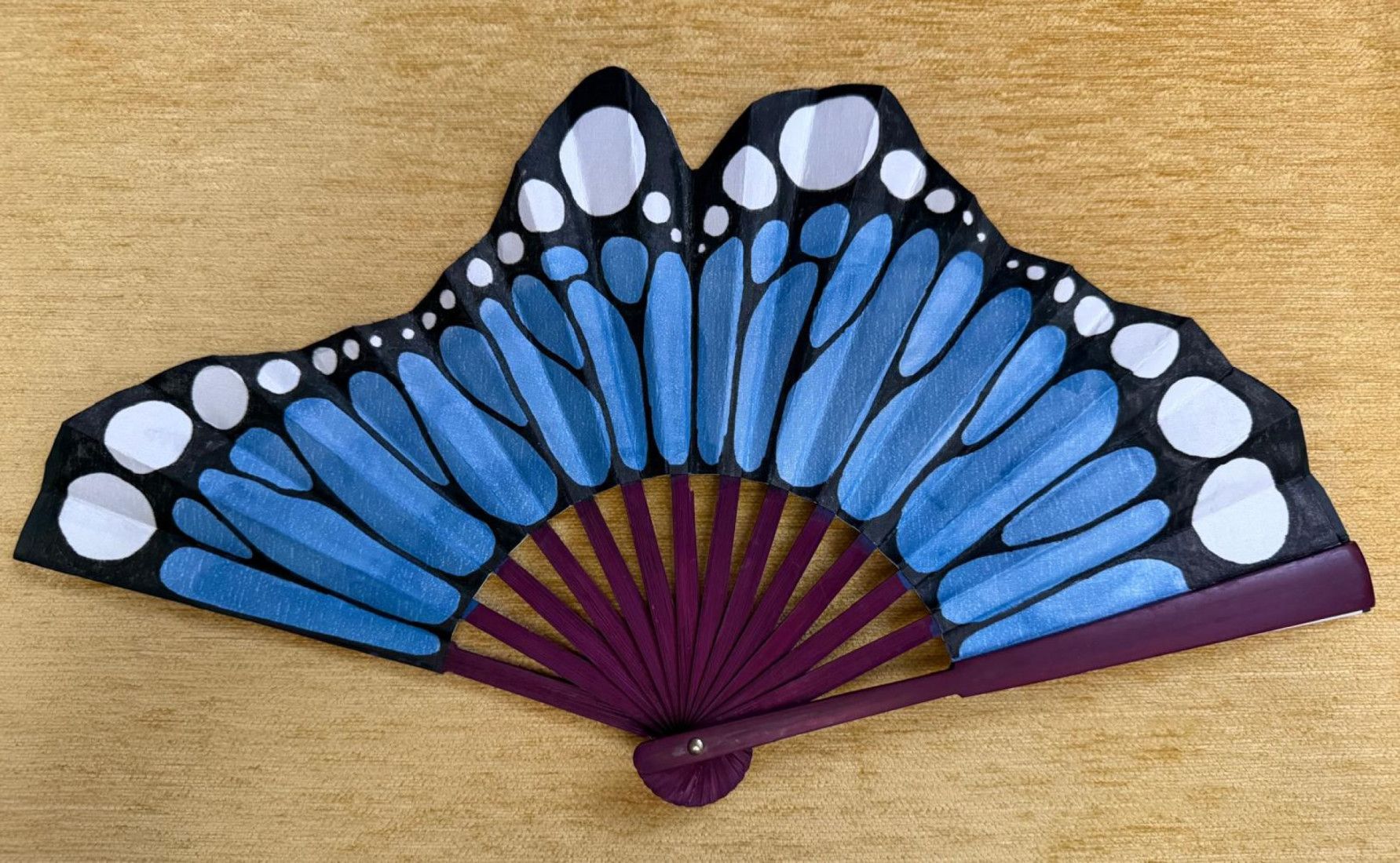 Abanico ala mariposa azul